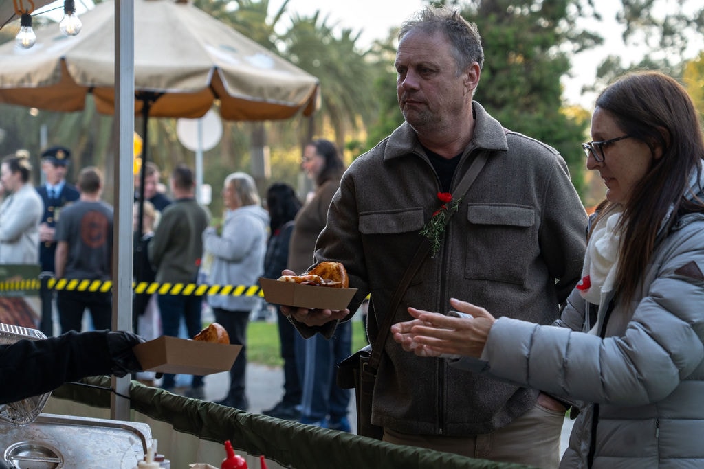 Queue at the Parachute Landing marquee, Anzac Day 2026