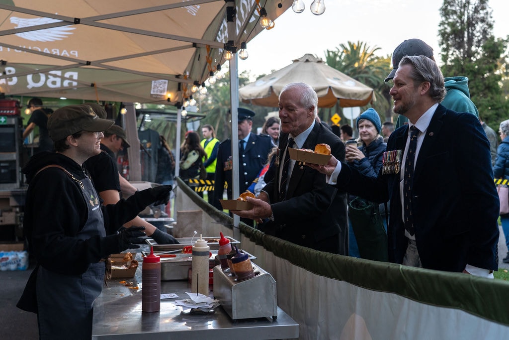 Parachute Landing team setting up the BBQ & Beer marquee before dawn, Anzac Day 2026