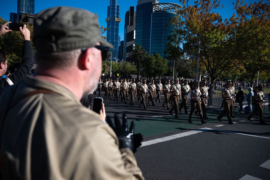 Parachute Landing crew working the smoker alongside the LRPV at Anzac Day 2026